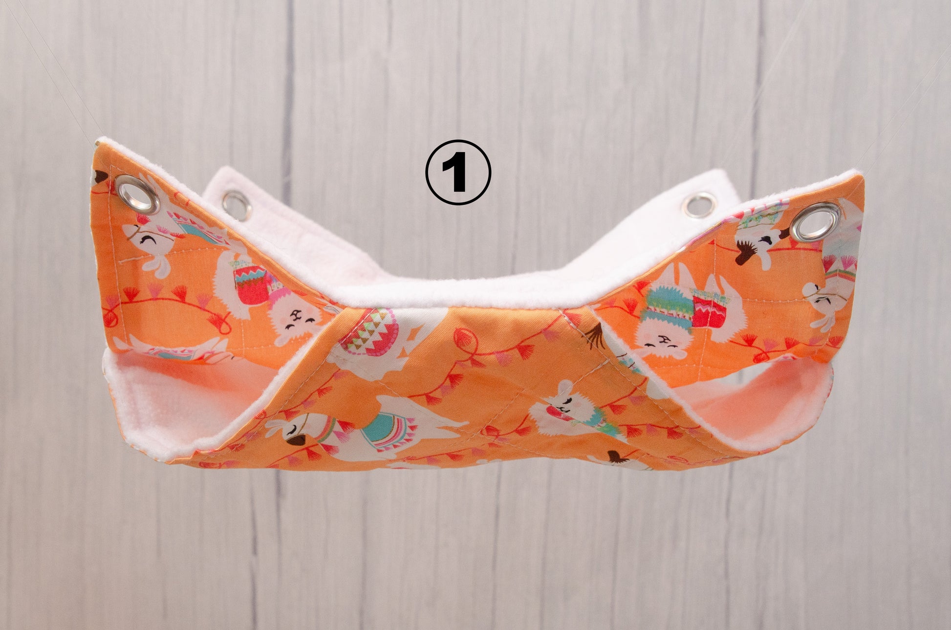 double hammock with white fleece and orange alpaca fabric