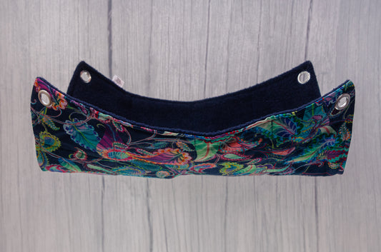 Flat rat hammock suspended in air, navy paisley pattern on fabric with 10mm eyelets in each corner