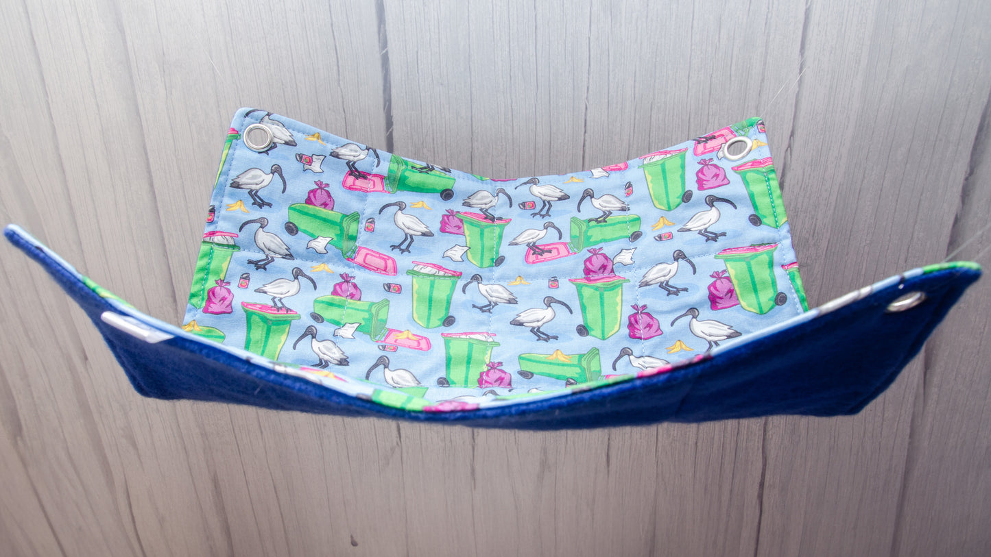 blue flat rat hammock with bin chicken and wheely bin pictures