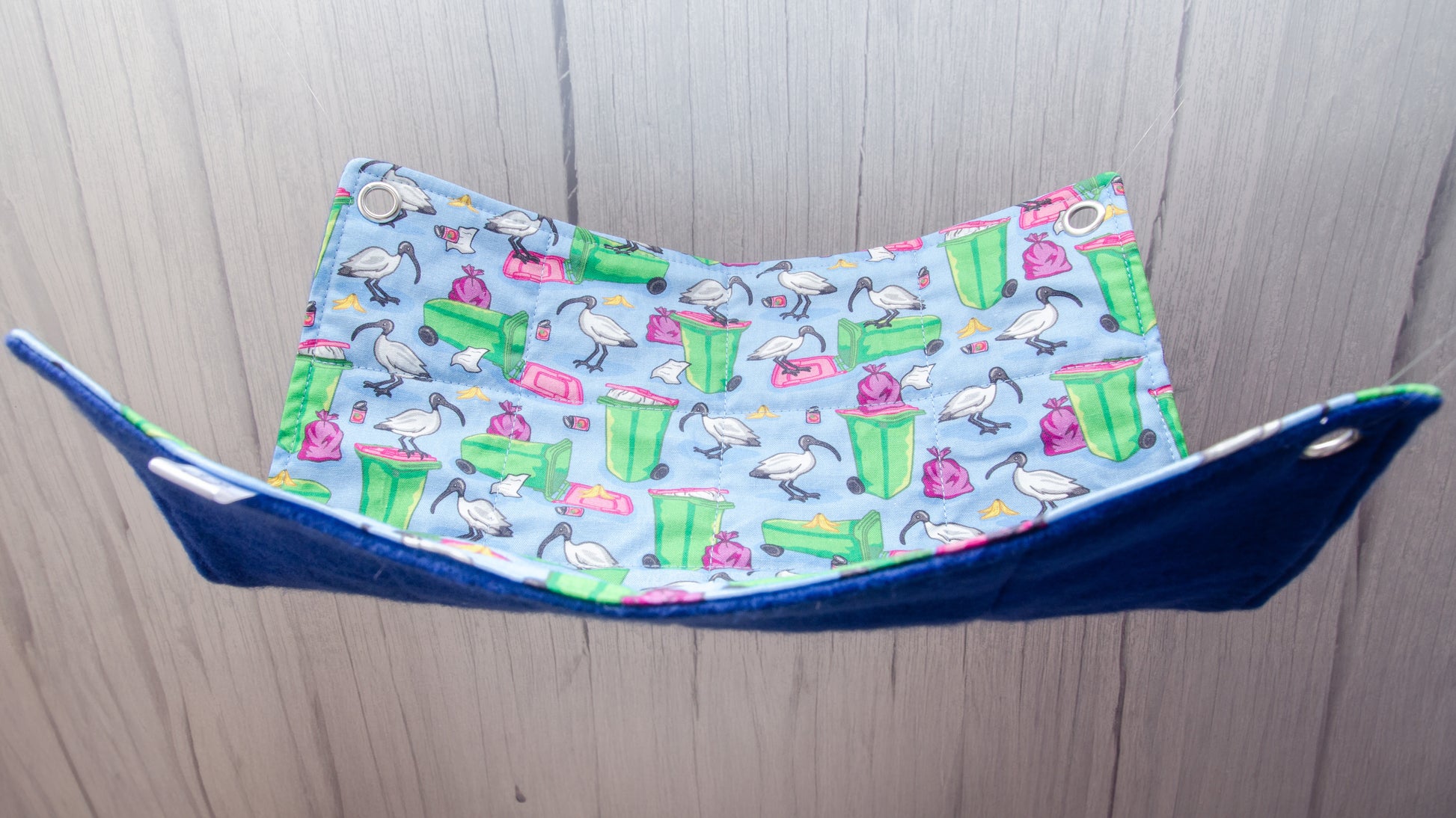 blue flat rat hammock with bin chicken and wheely bin pictures