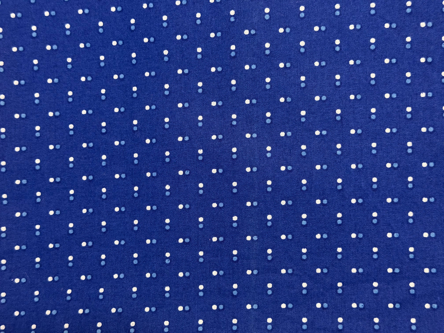 Blue fabric with white dot pattern