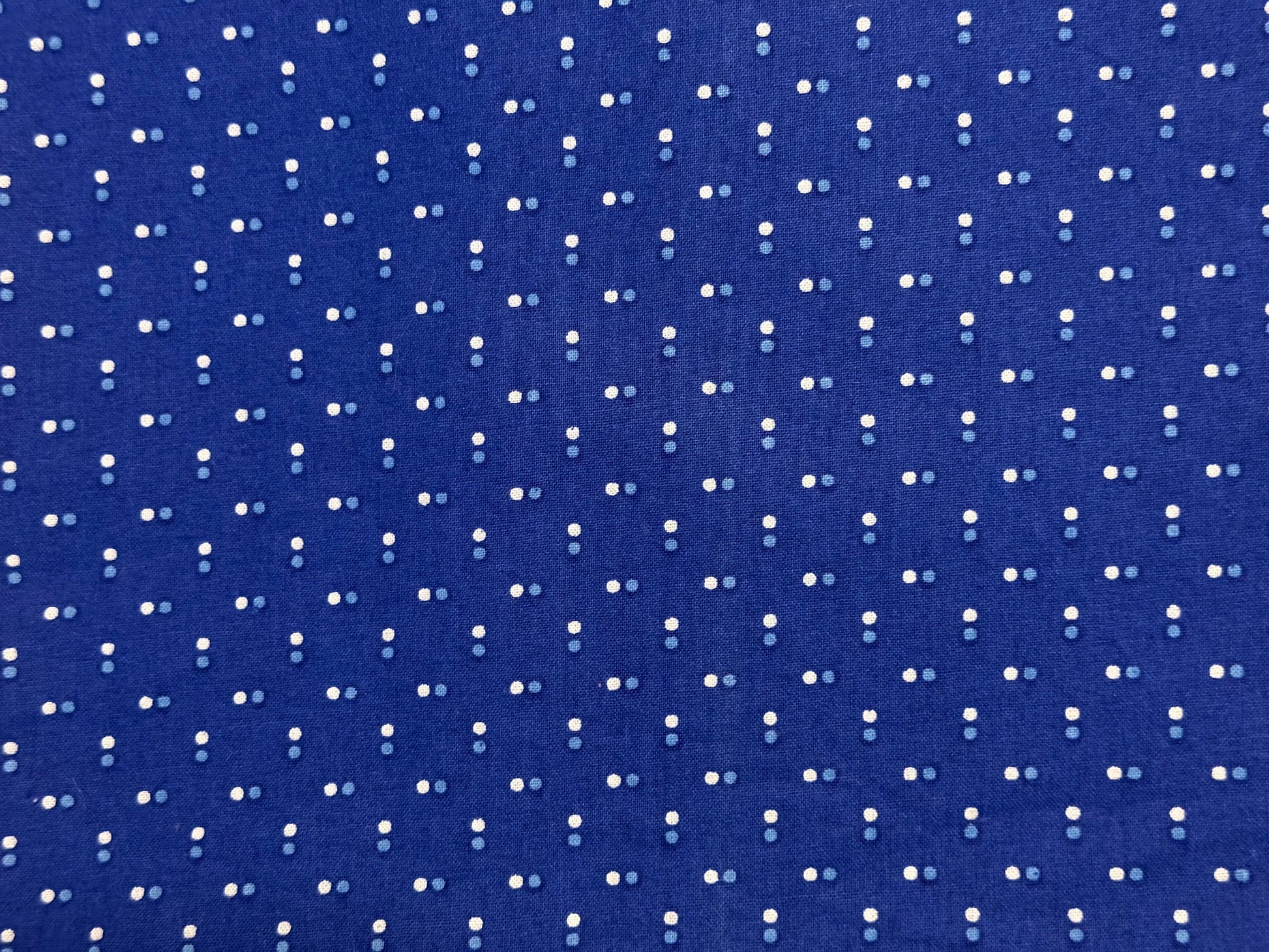 Blue fabric with white dot pattern